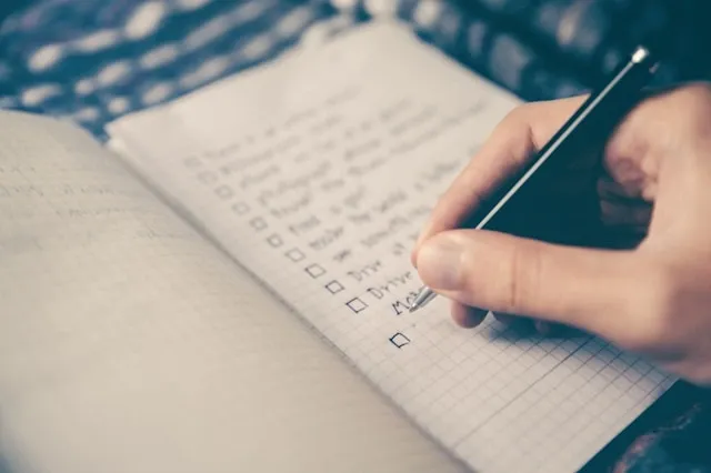 notebook and a hand writing